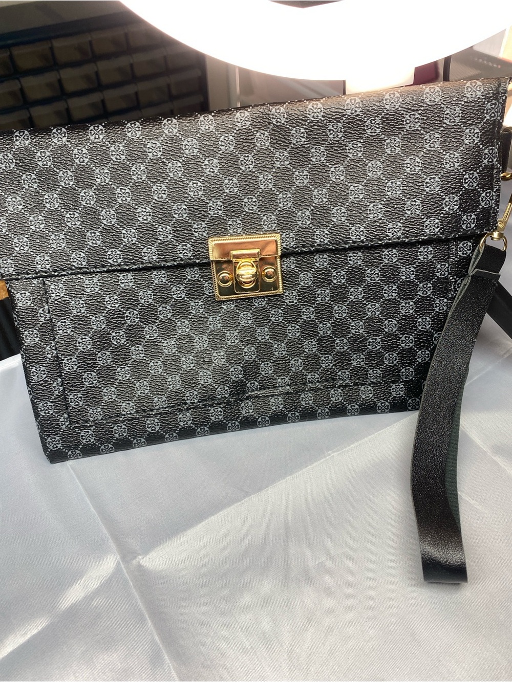 Black Patterned Wristlet Clutch with Gold Turn-Lock